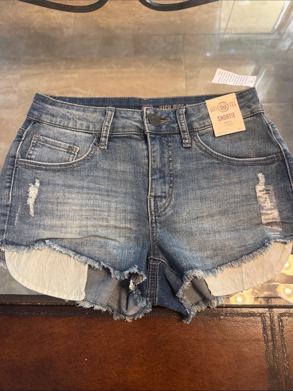 SO Light Blue Distressed High-Rise Jean Shortie